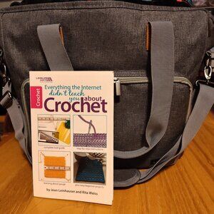 Crochet set with tote, hooks and beginner book.